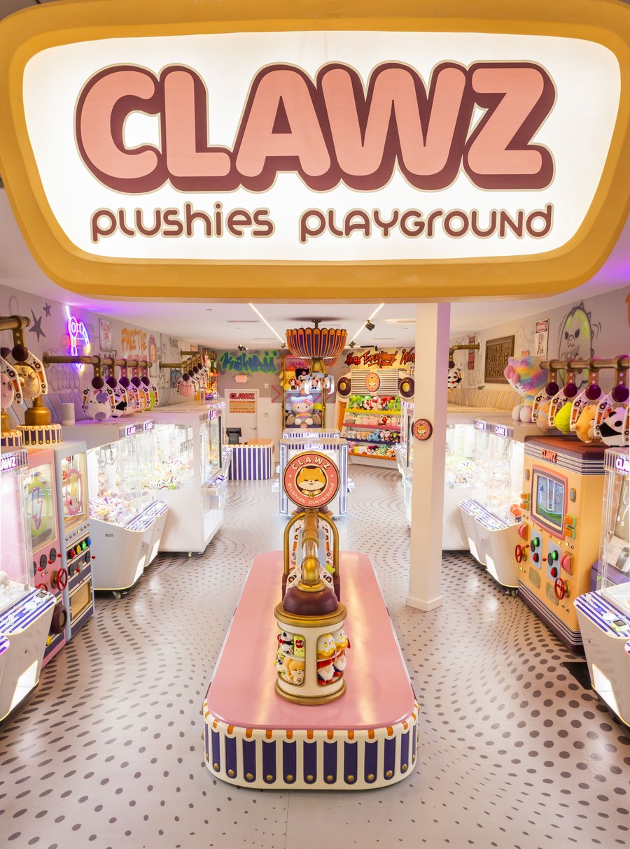 The Clawz Plushies Playground flagship arcade at Miami International Mall — giant CLAWZ sign over rows of claw machines